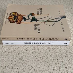 Poem Books Empty Bottles Full of Stories and Winter Roses After Fall.